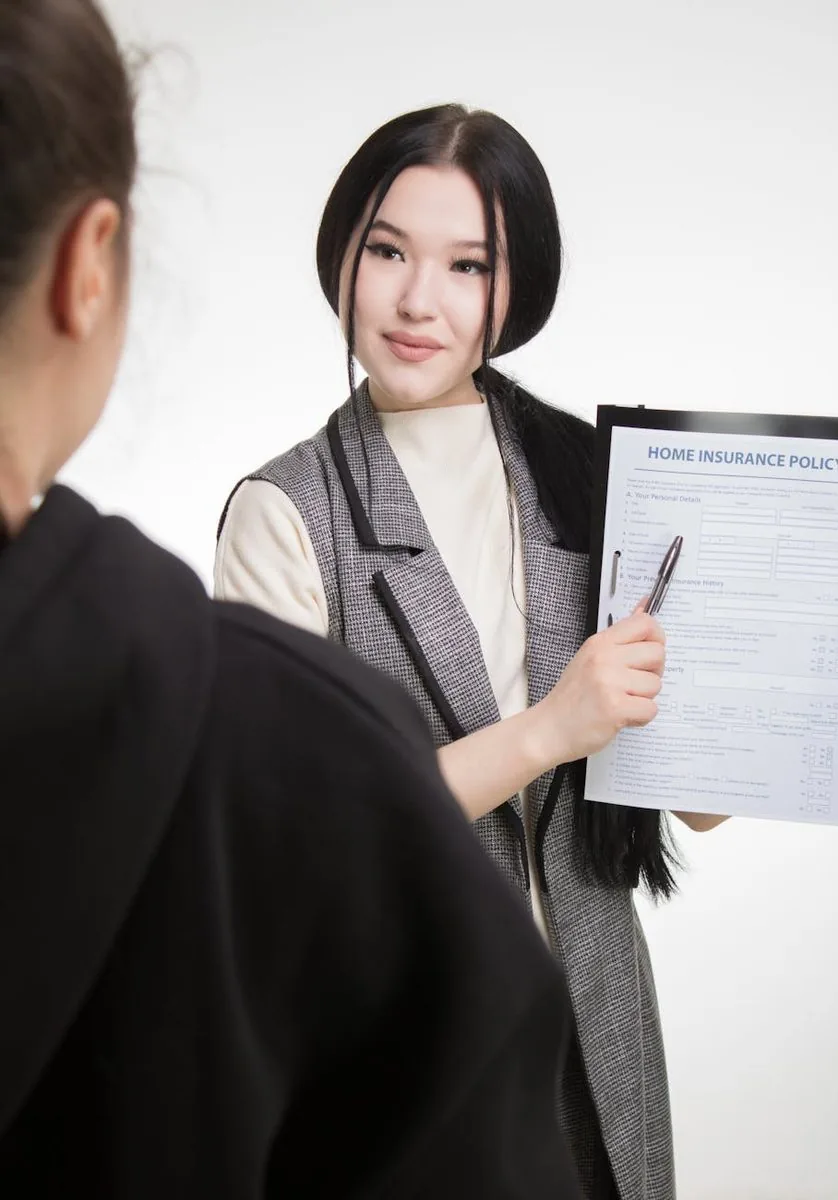 Jacky Catule, JCKC Financial Services, in conversation with a client