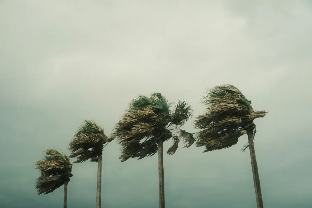 A storm system moving in over the water off the South Florida coast